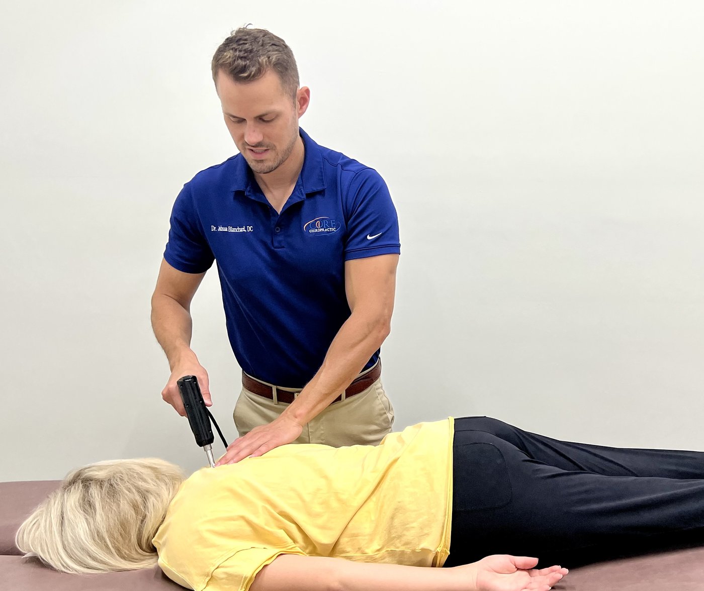 Dr. Josh Blanchard performing an Activator Method adjustment